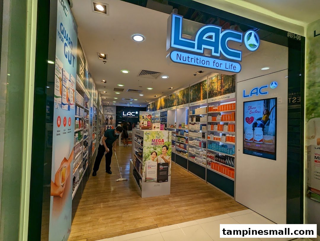 The storefront of LAC Nutrition For Life, a health and wellness shop, with products displayed inside.
