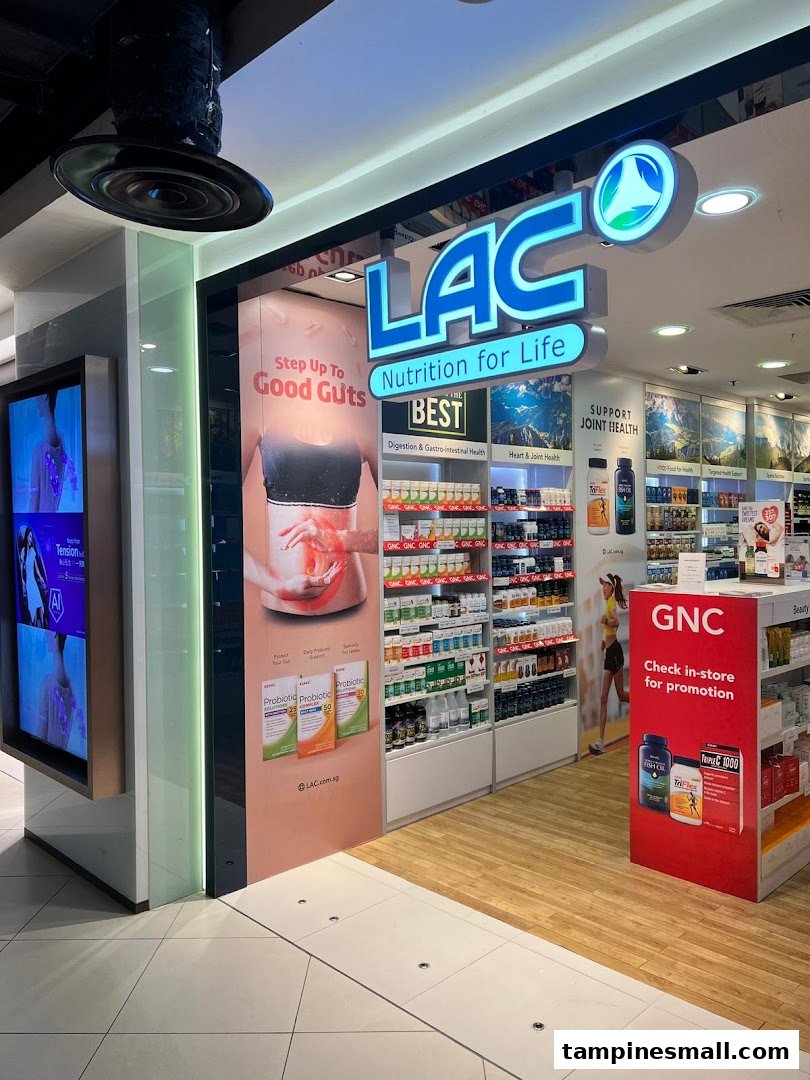The entrance of LAC Nutrition For Life, showcasing health supplements and promotional displays.