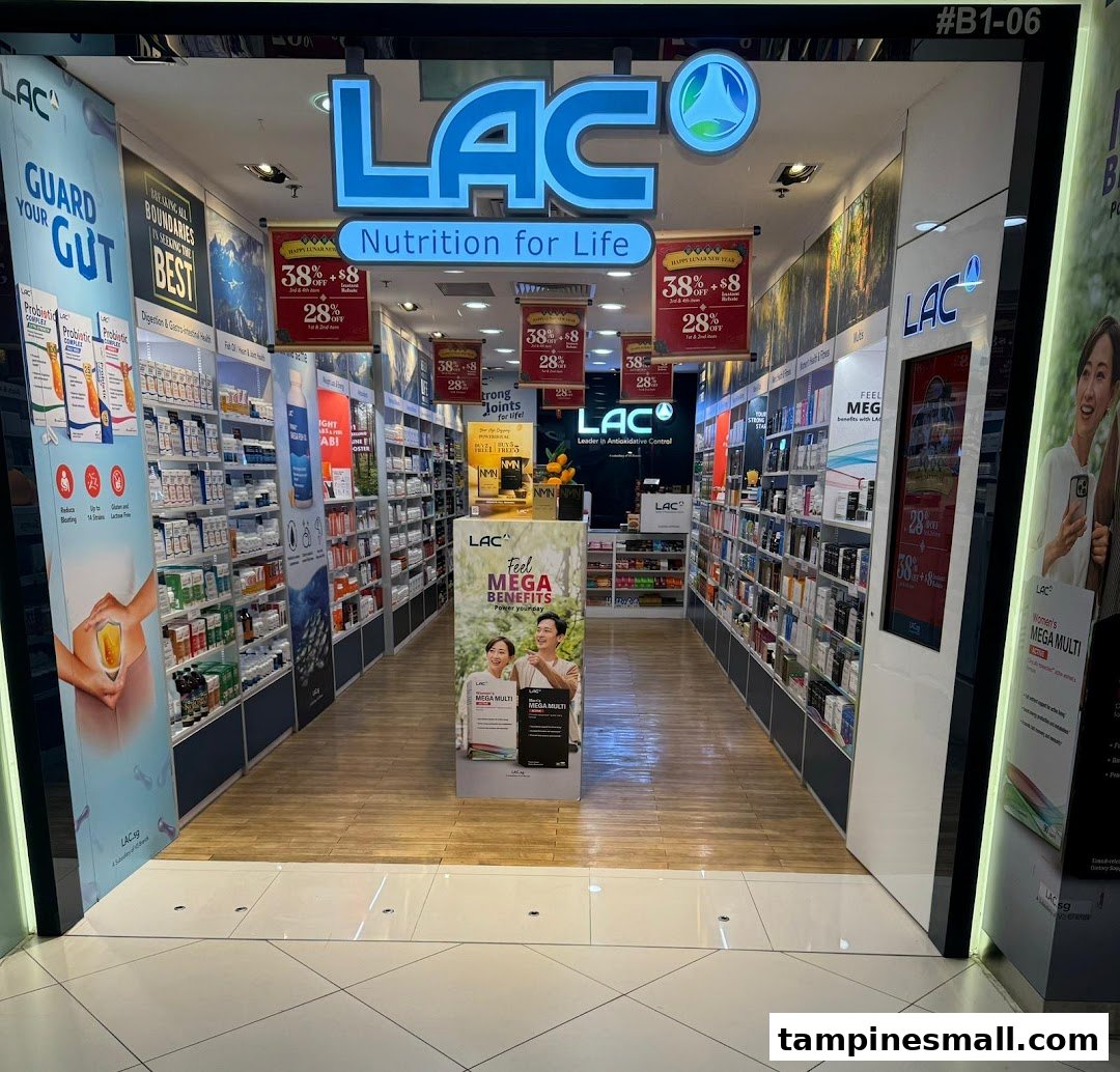 The storefront of LAC Nutrition for Life, a health and wellness store, showcasing various supplements and promotions.