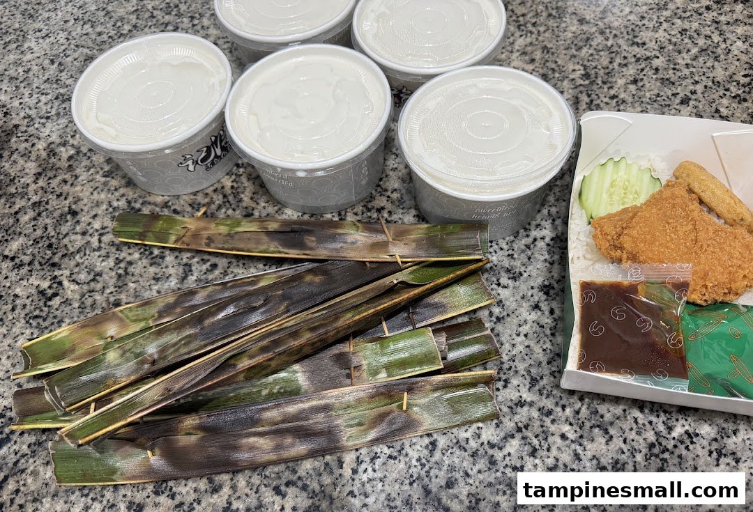 A delicious spread of Lee Wee Brothers' signature Otah, Nasi Lemak, and desserts/drinks.