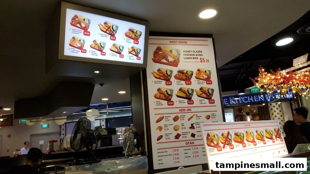 A vibrant menu display showcasing various Nasi Lemak lunch boxes and delicious add-ons at Lee Wee Brothers.