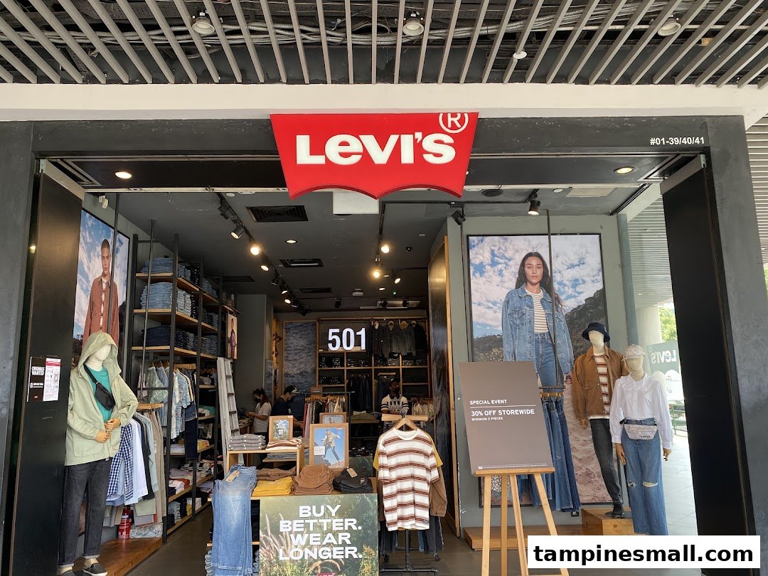The Levi's store entrance at Tampines Mall, showcasing denim apparel and a special event promotion.