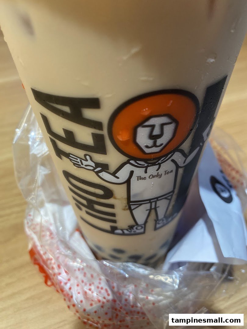 Close-up of a LiHO TEA bubble tea cup featuring its distinctive lion mascot and logo.