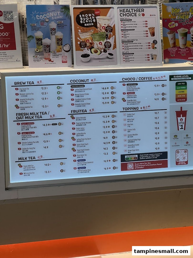 A detailed digital menu board displaying various bubble tea and beverage options with prices at LiHO TEA.