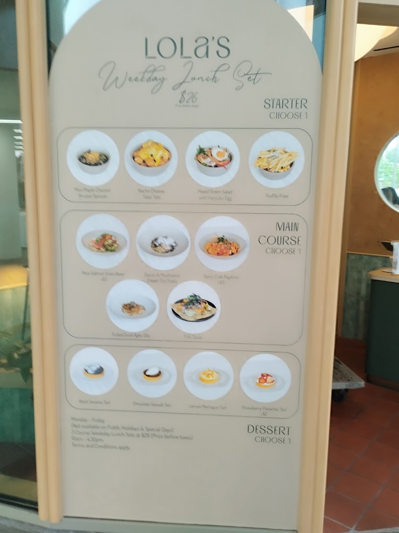 A menu board for Lola's featuring their Weekday Lunch Set with starters, main courses, and desserts.