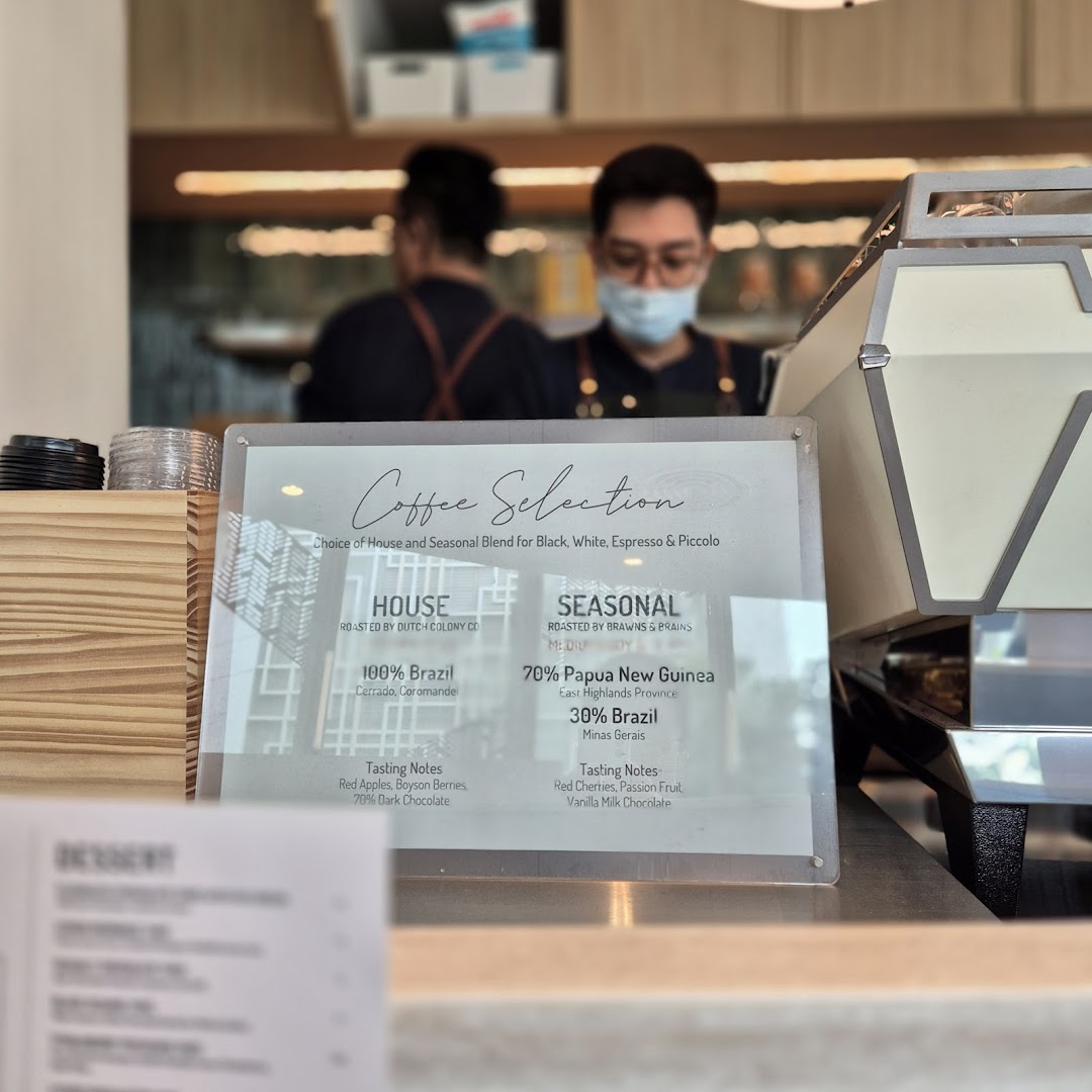 A coffee selection menu display with blend details and tasting notes at Lolas.