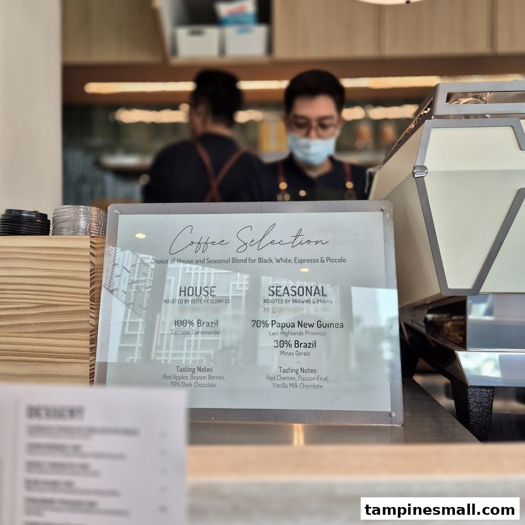 A coffee selection menu display with blend details and tasting notes at Lolas.