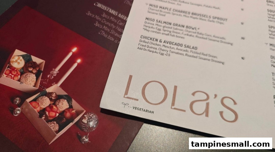 A close-up of Lola's menu featuring main dishes and festive Christmas miniature desserts.