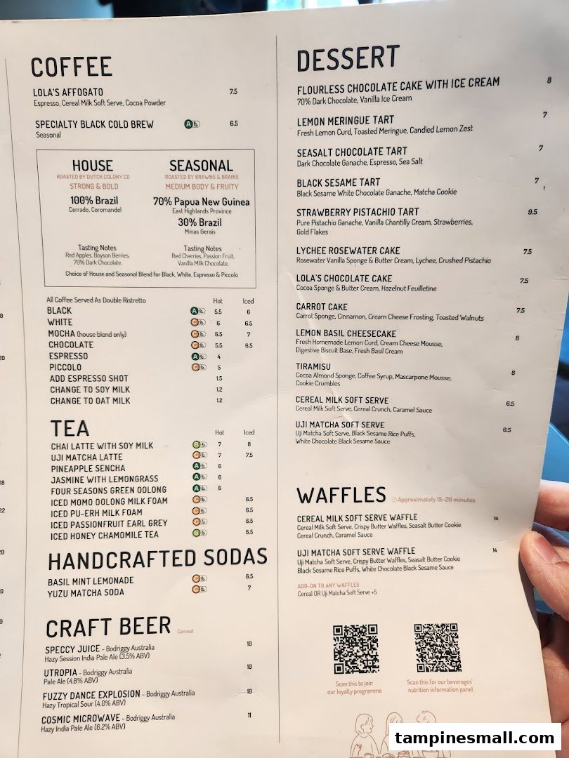 A detailed menu from Lolas, showcasing a variety of coffee, desserts, teas, sodas, craft beers, and waffles.