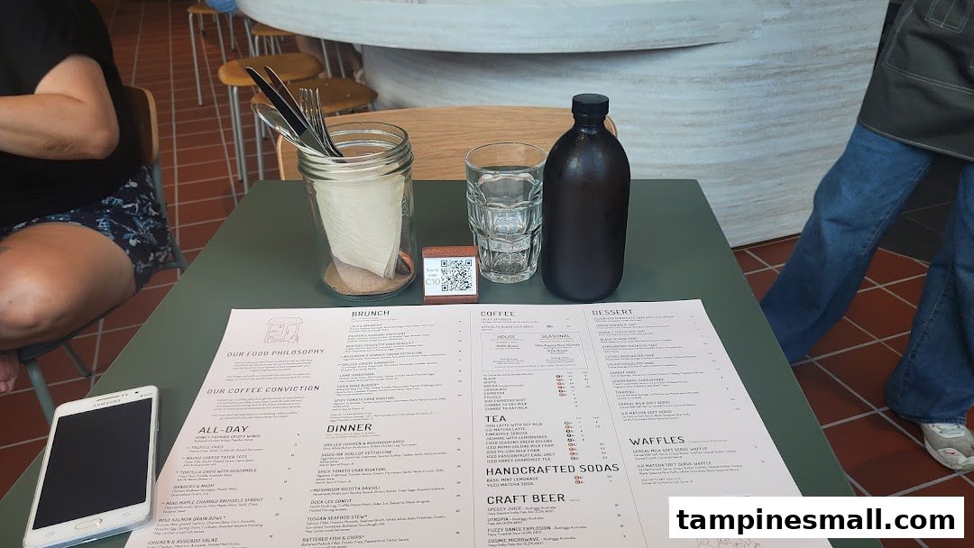 A detailed menu from Lolas cafe, featuring brunch, all-day, dinner, coffee, tea, sodas, craft beer, desserts, and waffles.