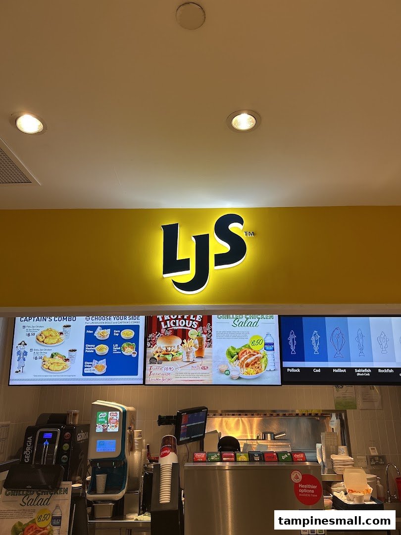 Digital menu boards at Long John Silver's displaying combos, sides, and salads above the counter.