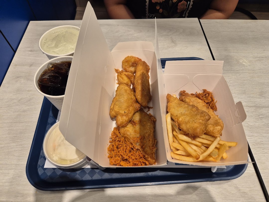 A tray with two boxes of Long John Silver's fried fish and shrimp, fries, drinks, and coleslaw.