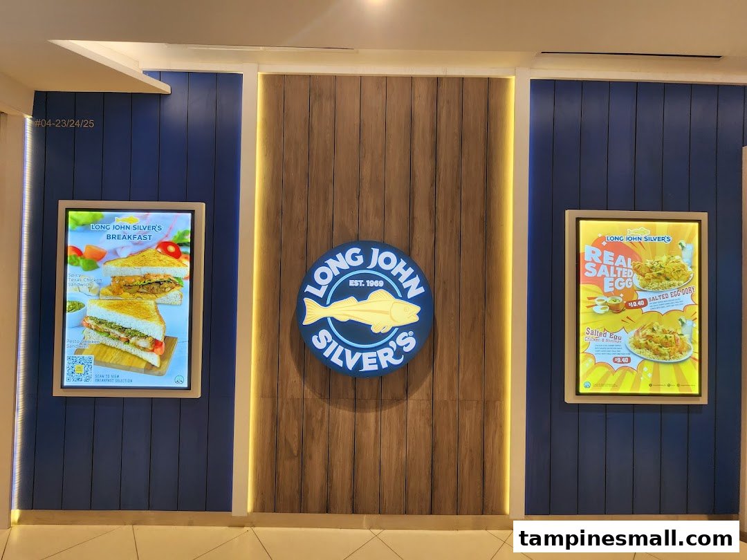 Interior wall of Long John Silver's featuring illuminated promotional menu displays for breakfast and salted egg dishes.