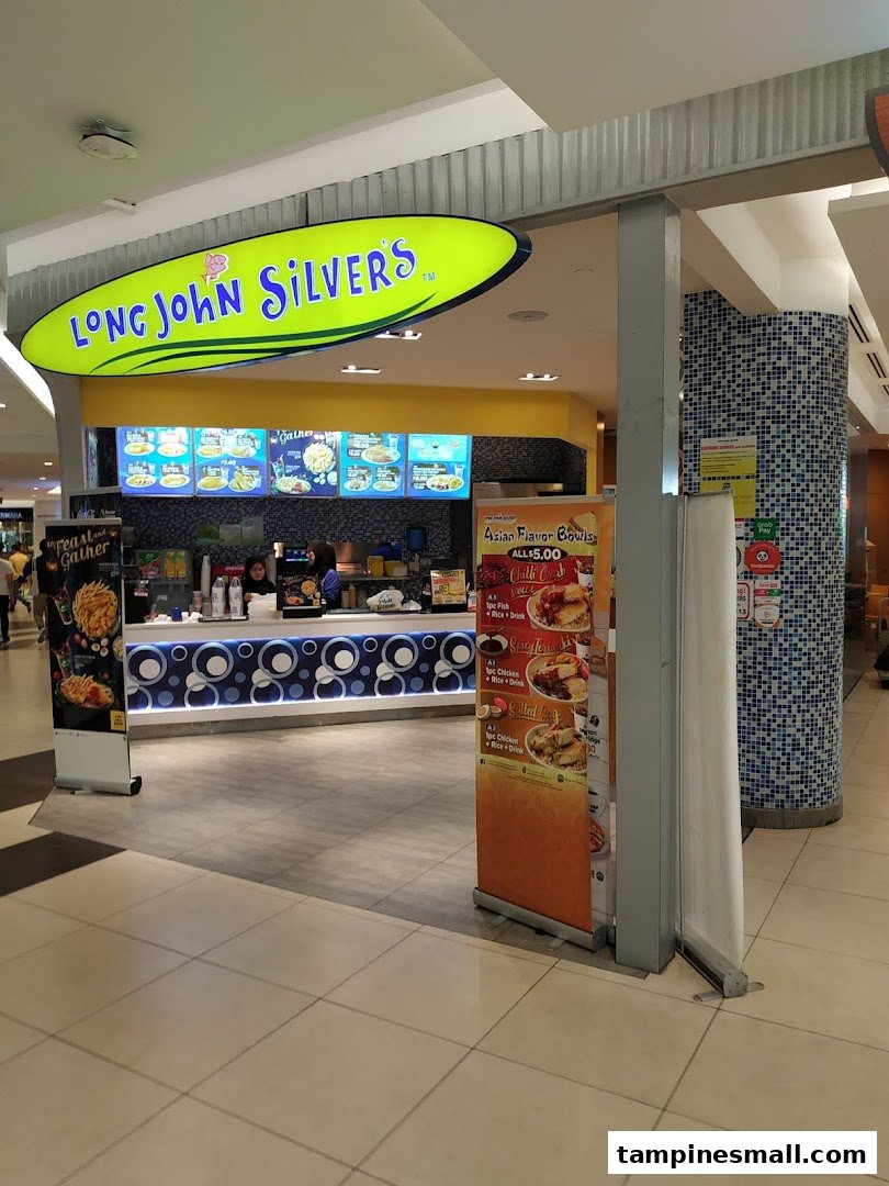 The vibrant entrance of Long John Silver's fast-food restaurant, featuring its counter and signage.