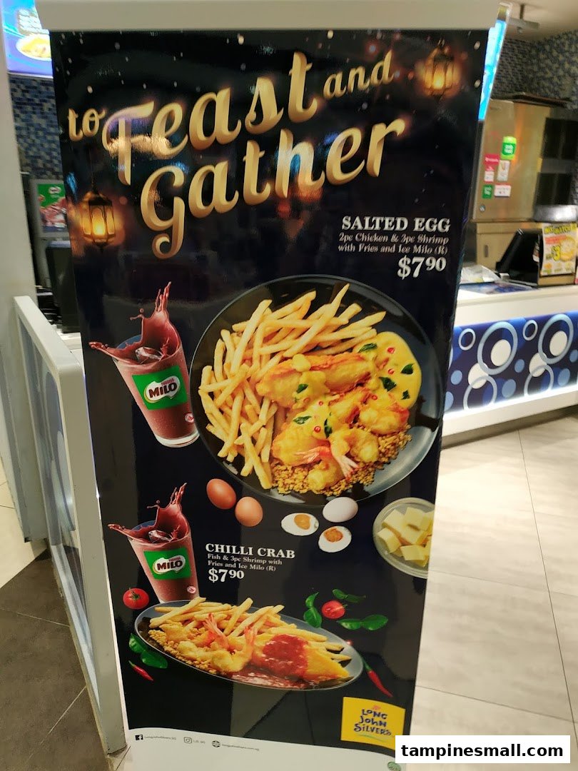A promotional stand for Long John Silver's featuring Salted Egg and Chilli Crab meals with Milo.