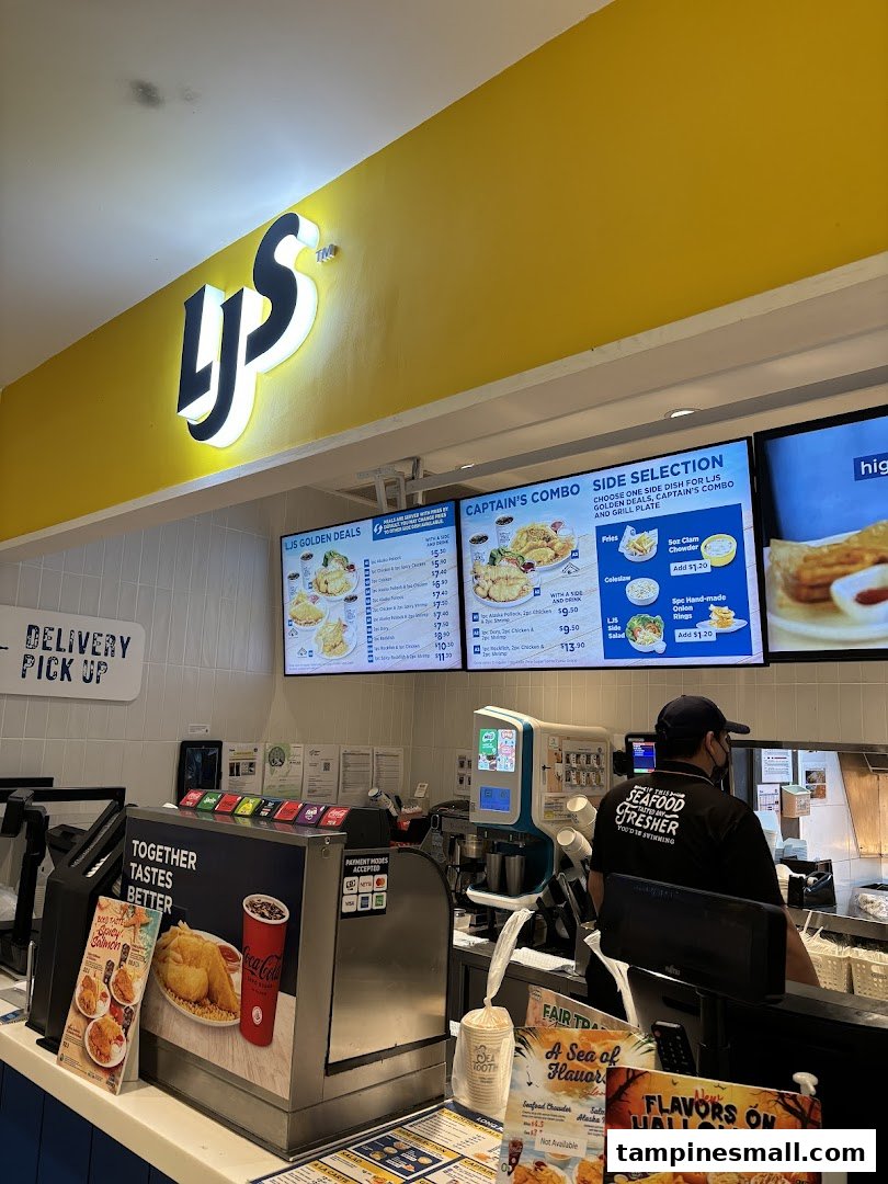 Interior view of Long John Silver's counter with prominent menu boards displaying food items and prices.
