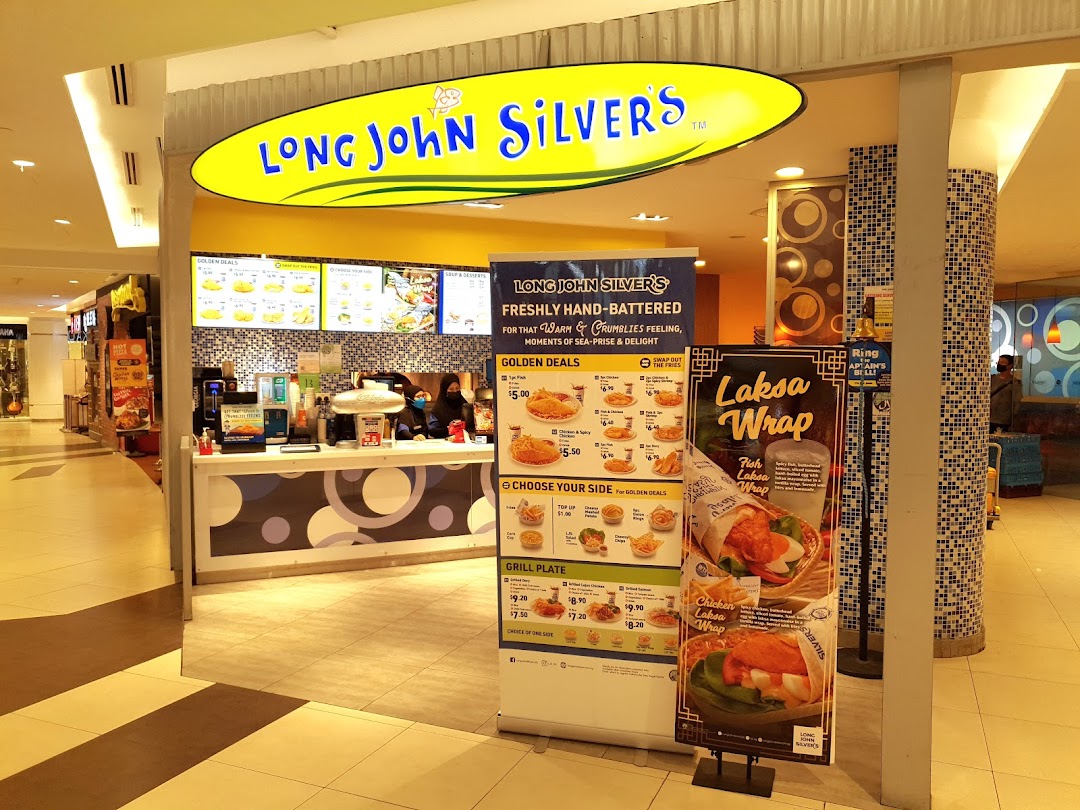 The brightly lit entrance of Long John Silver's, featuring its iconic yellow sign and promotional banners.