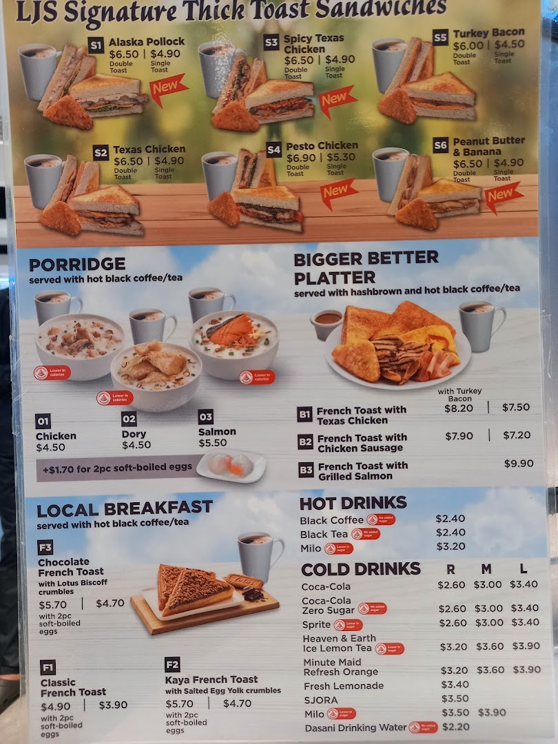 A detailed menu board displaying breakfast items, sandwiches, porridge, and various hot and cold beverages.