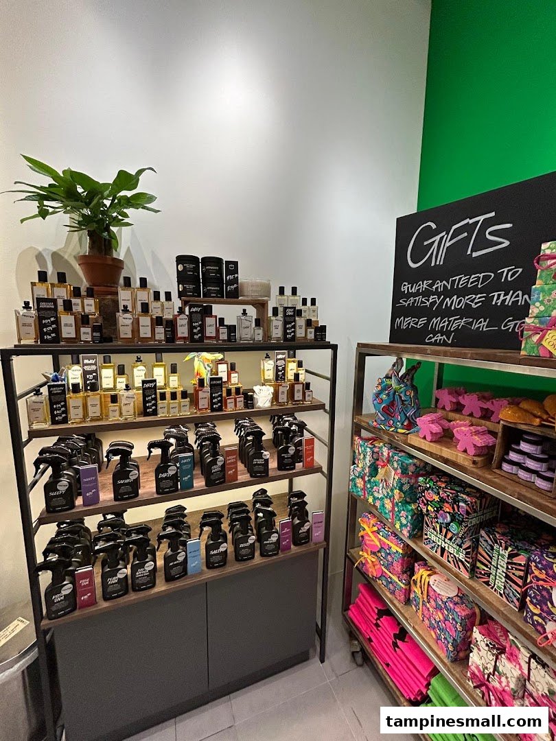 An interior shot of Lush, showcasing a wide array of perfumes, body sprays, and colorful gift sets.