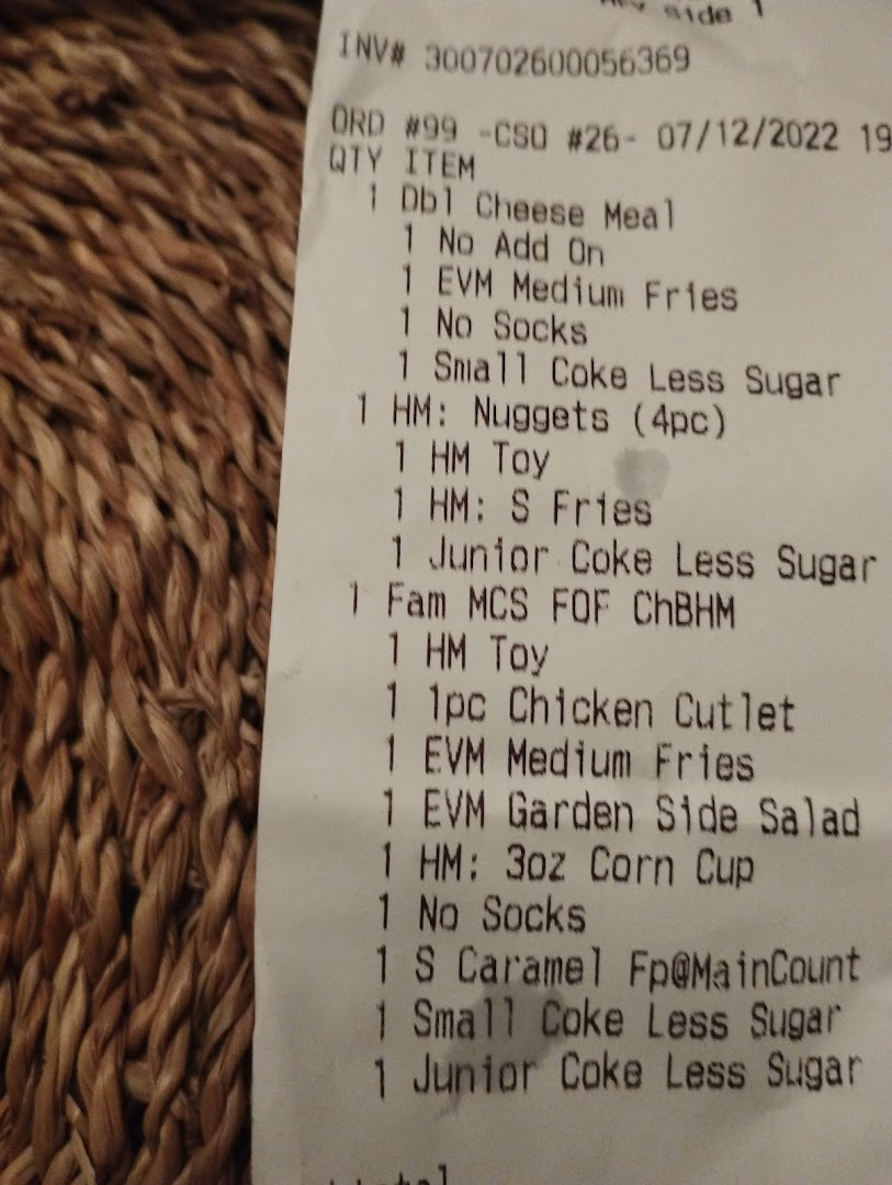 A close-up view of a McDonald's order receipt detailing various food items.