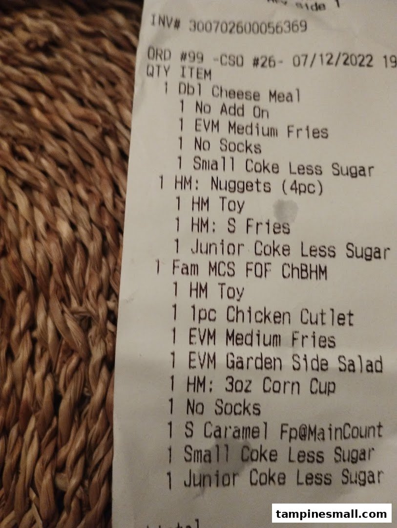 A close-up view of a McDonald's order receipt detailing various food items.
