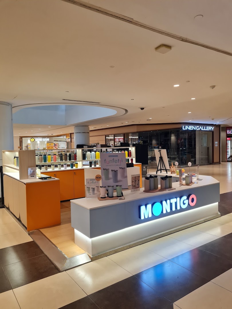A Montigo kiosk in a mall showcasing a variety of colorful tumblers and hydration bottles.