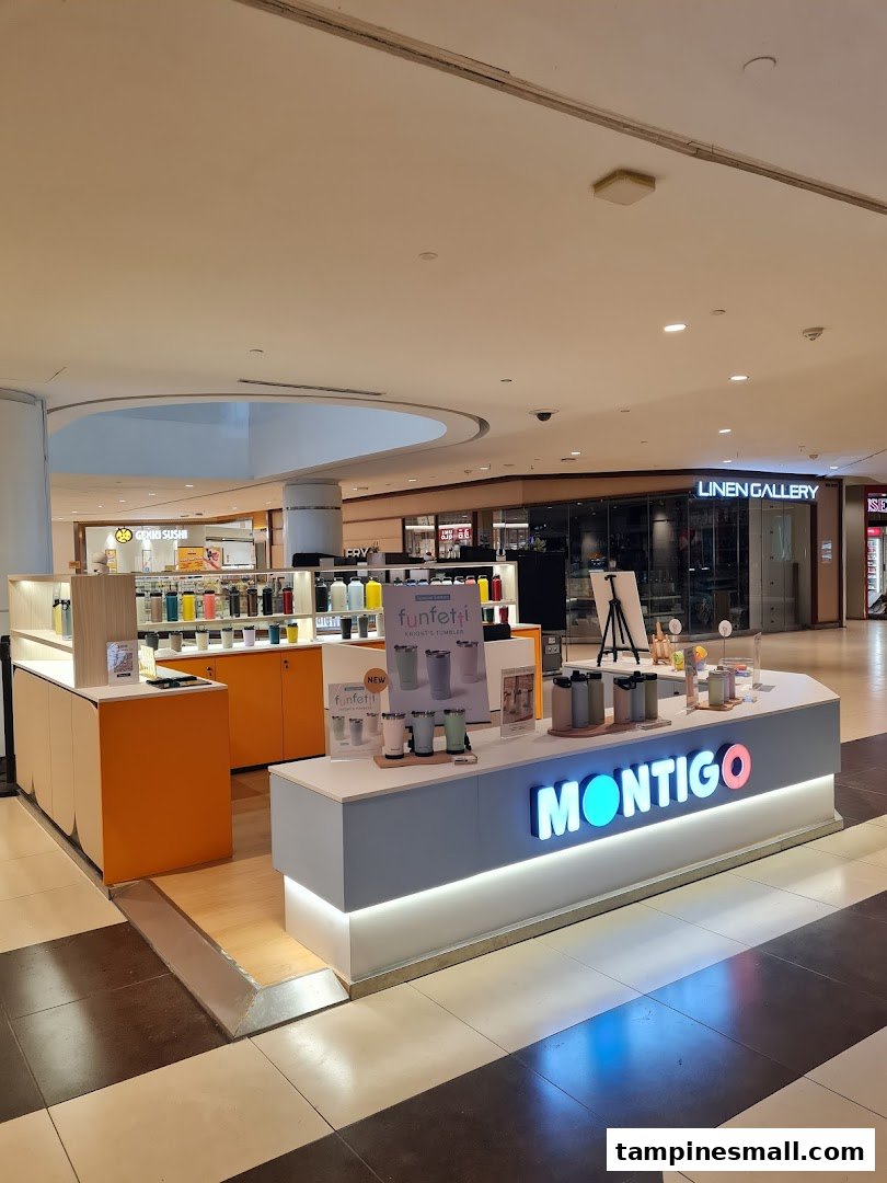A Montigo kiosk in a mall showcasing a variety of colorful tumblers and hydration bottles.