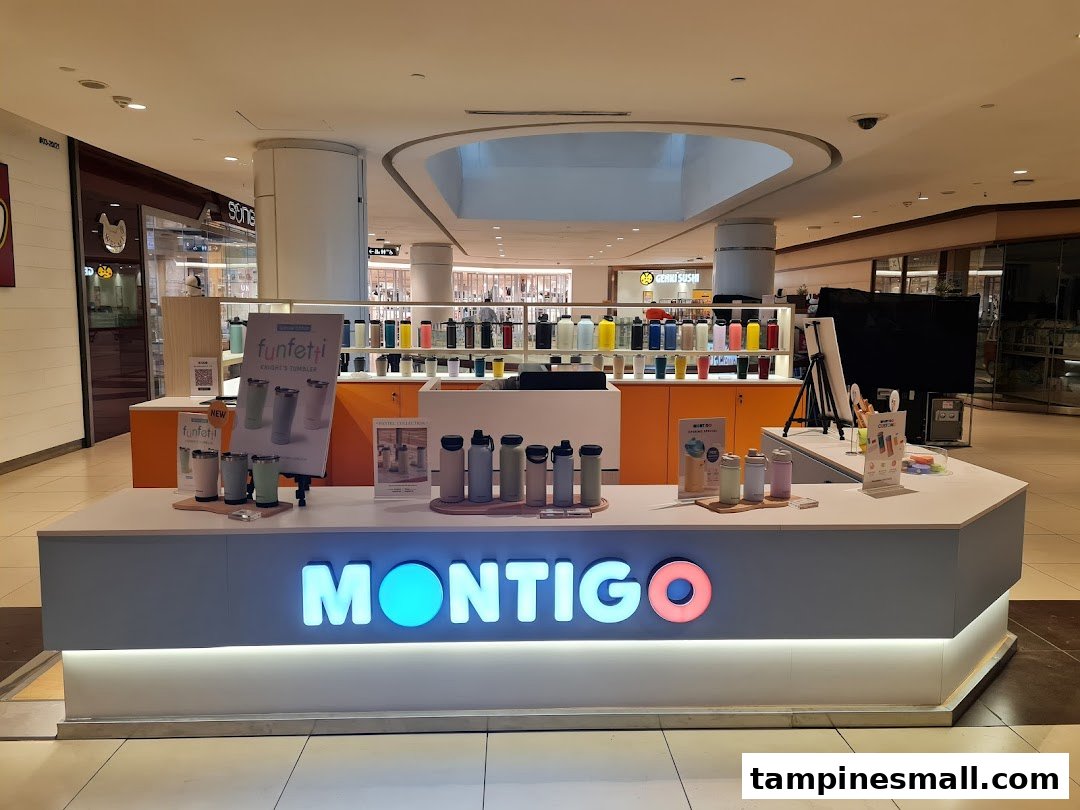 A Montigo kiosk in a shopping mall displaying a wide range of colorful tumblers and bottles.