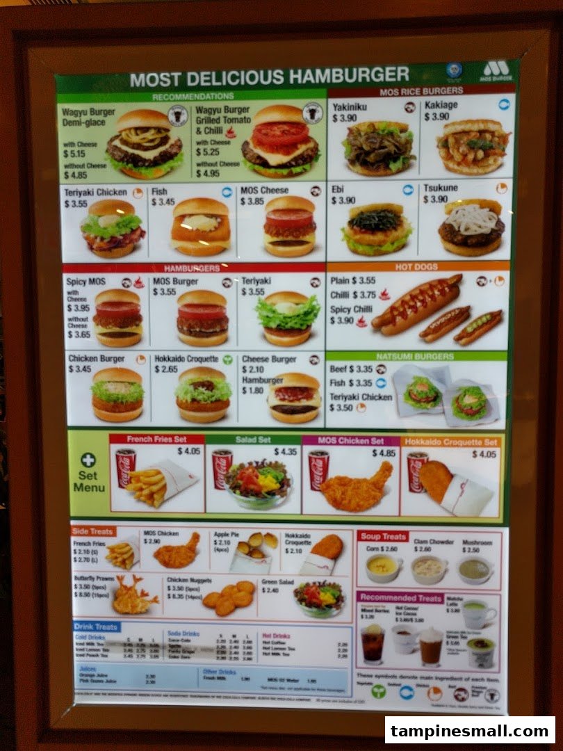 A brightly lit menu board displaying a wide variety of burgers, hot dogs, sides, and drinks from MOS Burger.