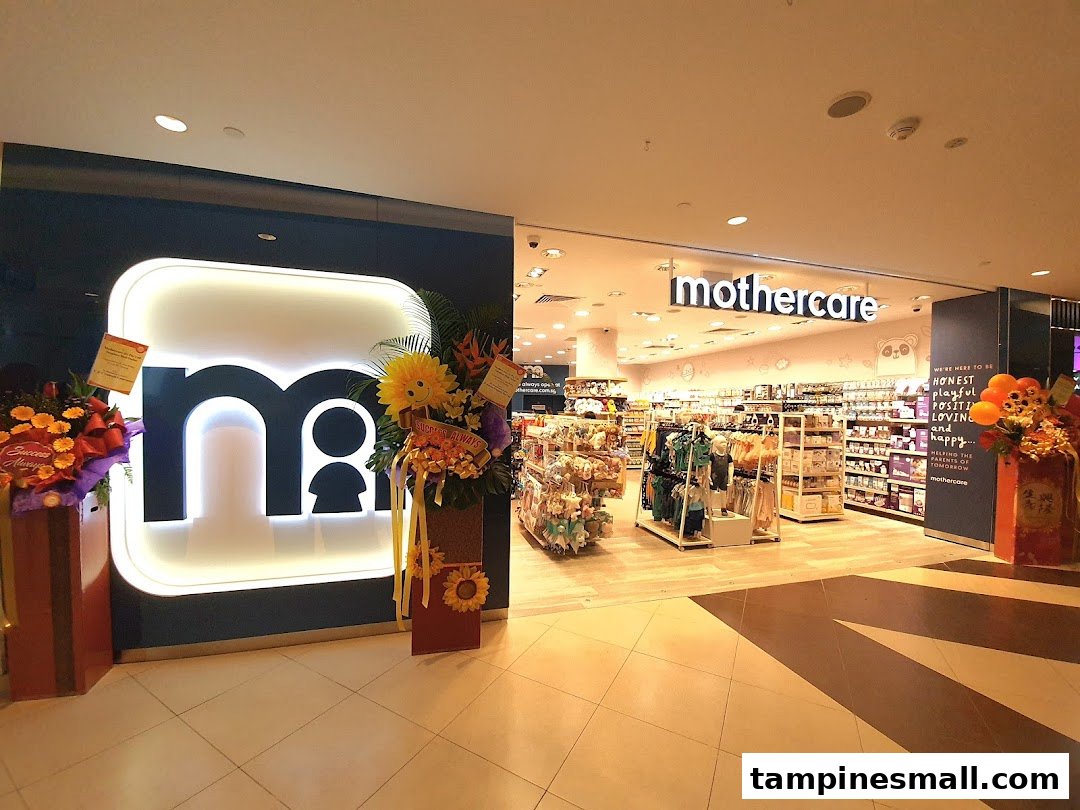 The brightly lit entrance of Mothercare at Tampines Mall, showcasing its wide range of baby and maternity products.