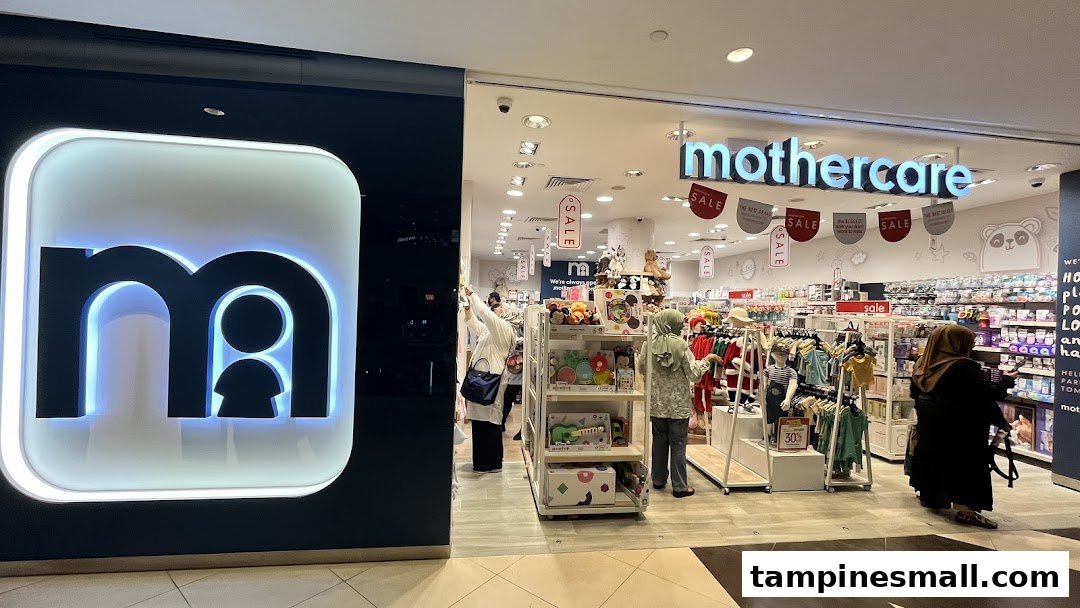 The Mothercare shop entrance at Tampines Mall, showcasing its logo, interior filled with baby products, and customers browsing.