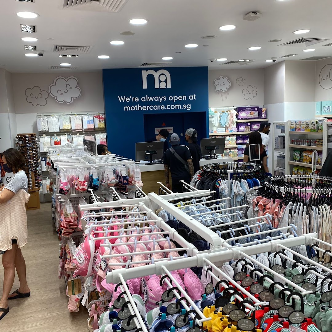An interior view of Mothercare, showcasing a wide range of baby and children's clothing, footwear, and essentials.