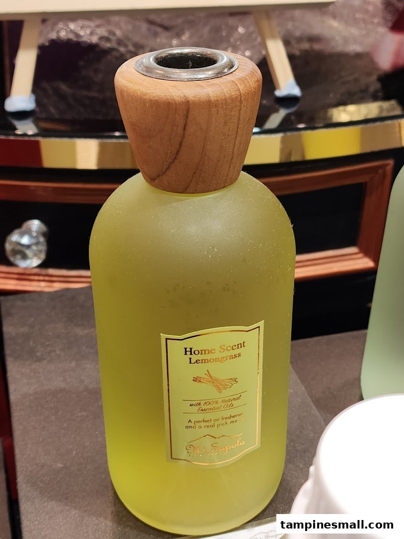 A close-up of a Mt.Sapola Lemongrass Home Scent diffuser bottle with natural essential oils.