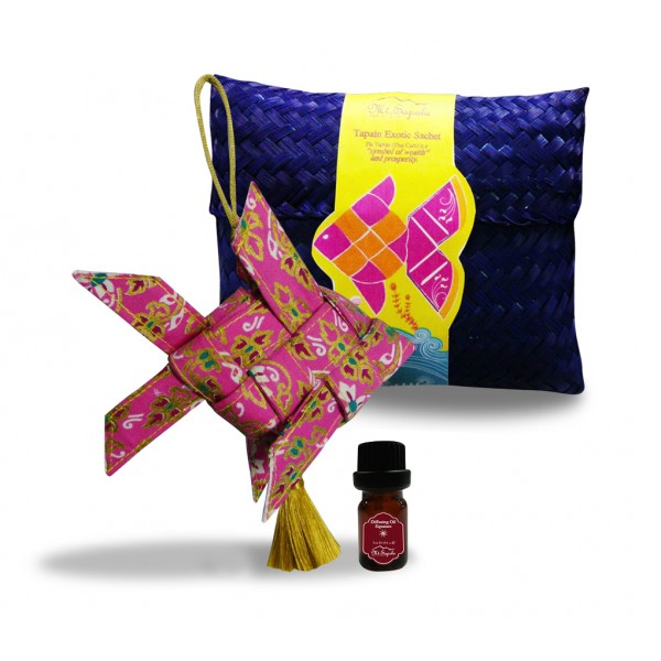 A Mt.Sapola Tapain Exotic Sachet set with a woven fish ornament and a diffusing oil bottle.
