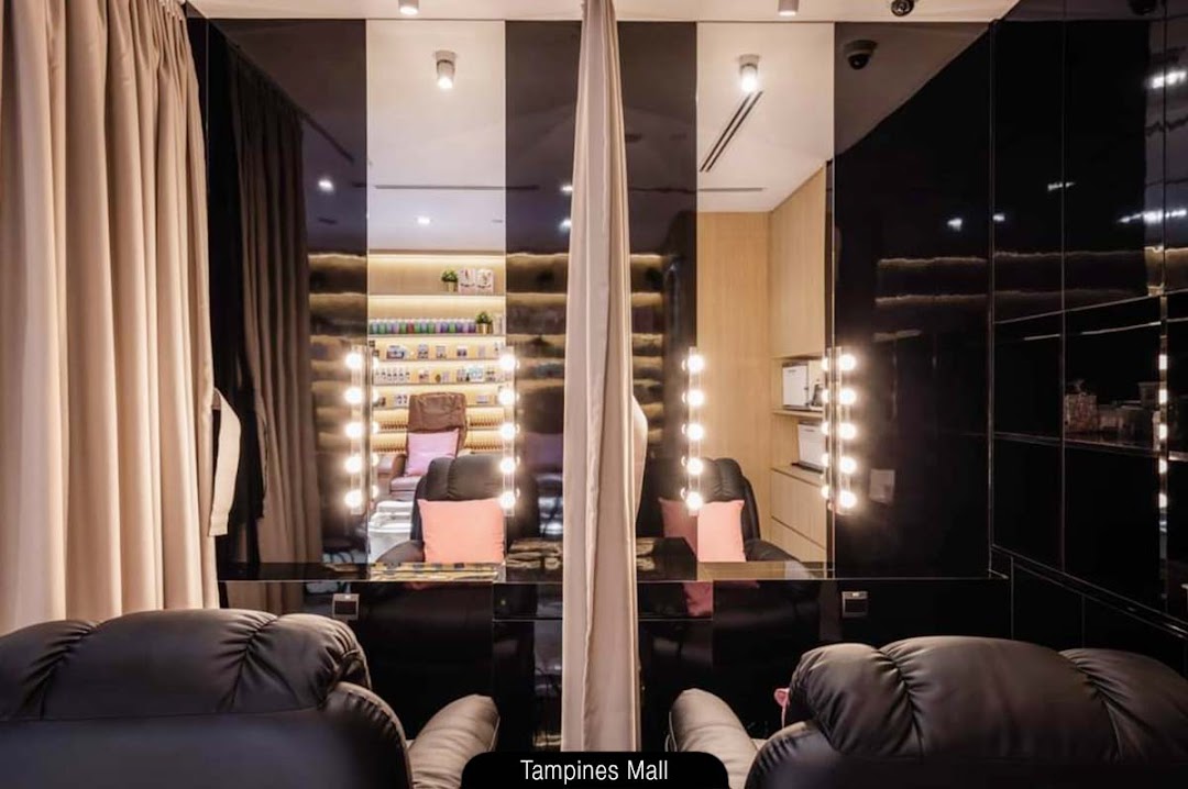 Interior view of N20 Nail Spa showing comfortable chairs, vanity mirrors, and nail product displays.