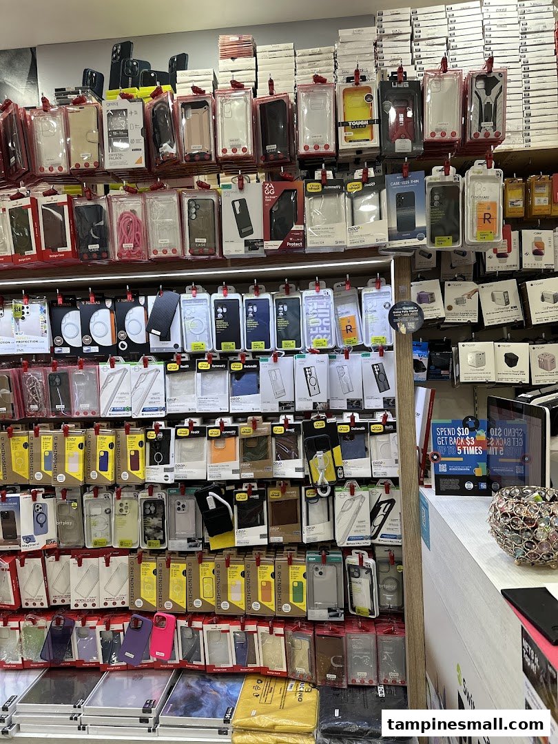 A retail display wall showcasing a wide variety of phone cases and mobile accessories.