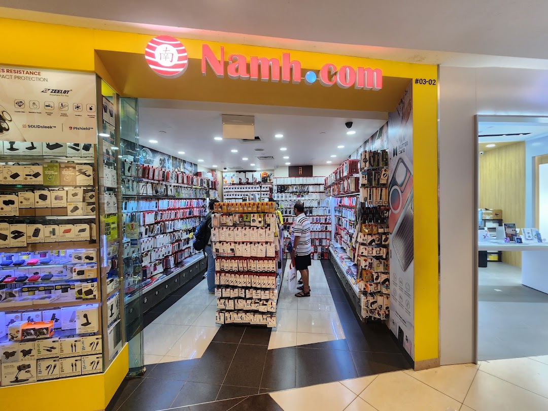 The shop front of Namh.com, a mobile accessories store, displaying a wide range of phone cases and gadgets.