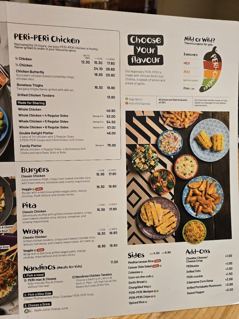 A detailed menu from Nandos, showcasing their PERI-PERI chicken, burgers, sides, and more.