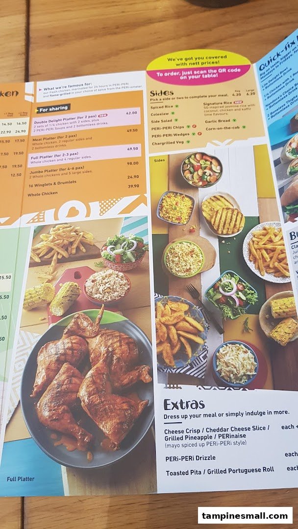 A close-up view of a Nandos menu, showcasing platters, sides, and extras with vibrant food photography.