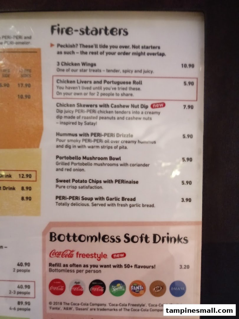 A detailed view of Nandos' 'Fire-starters' and 'Bottomless Soft Drinks' menu sections.