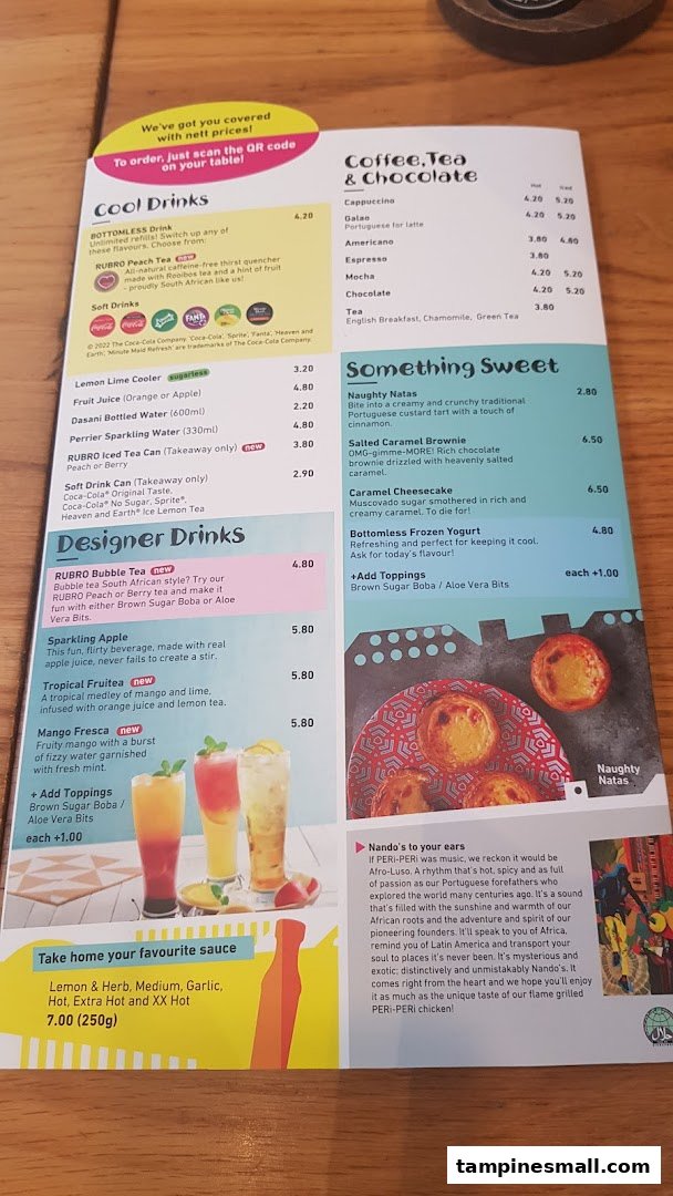 A detailed menu from Nando's, showcasing a variety of drinks, desserts, and sauces.