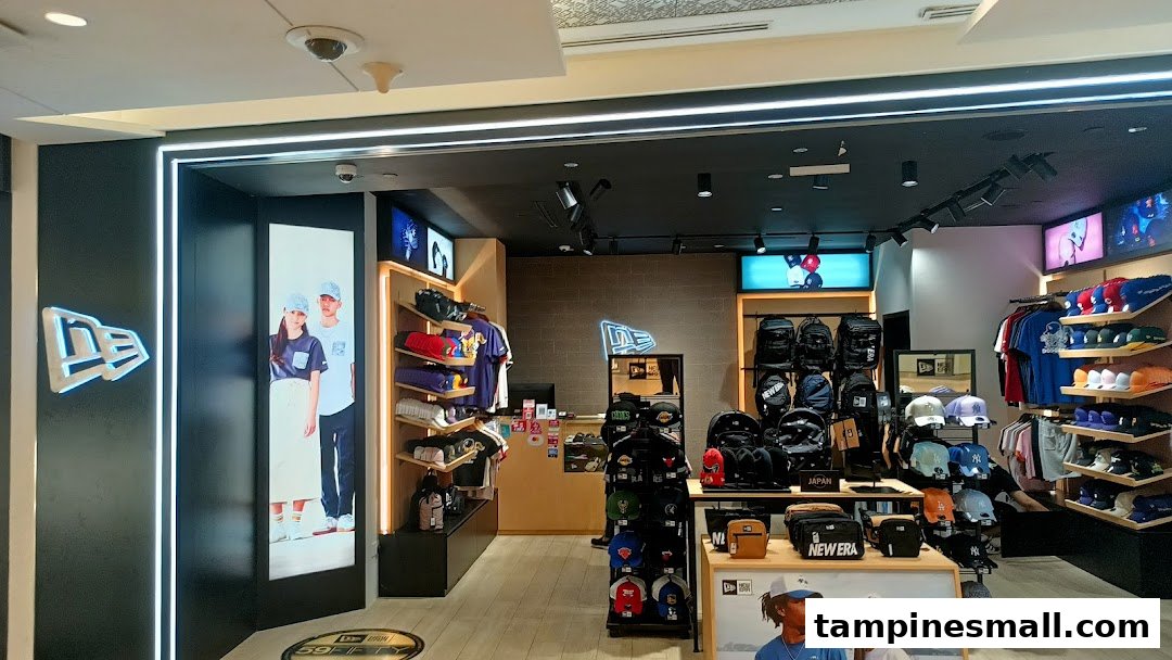 The interior of a New Era store, showcasing caps, apparel, and accessories.