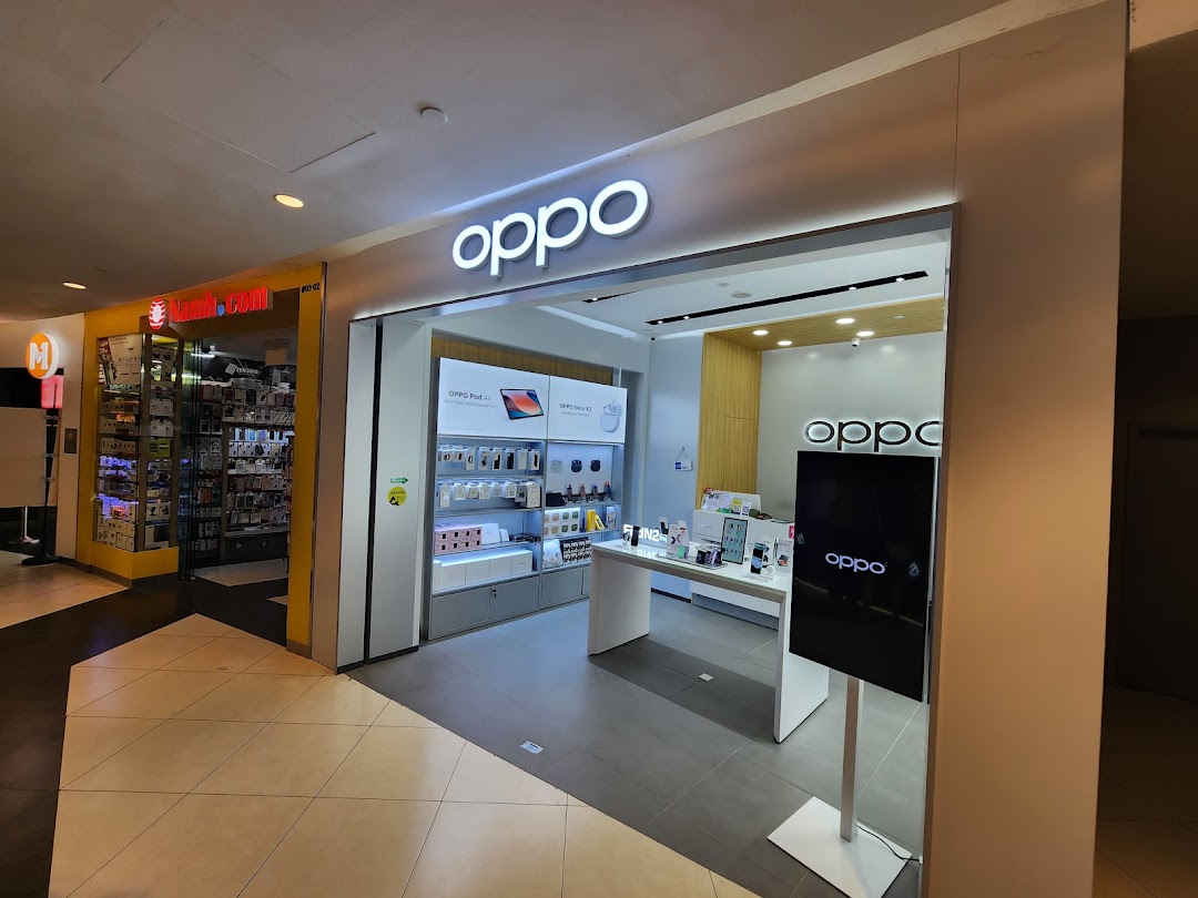 The brightly lit entrance of an OPPO Concept Store showcasing smartphones and accessories.