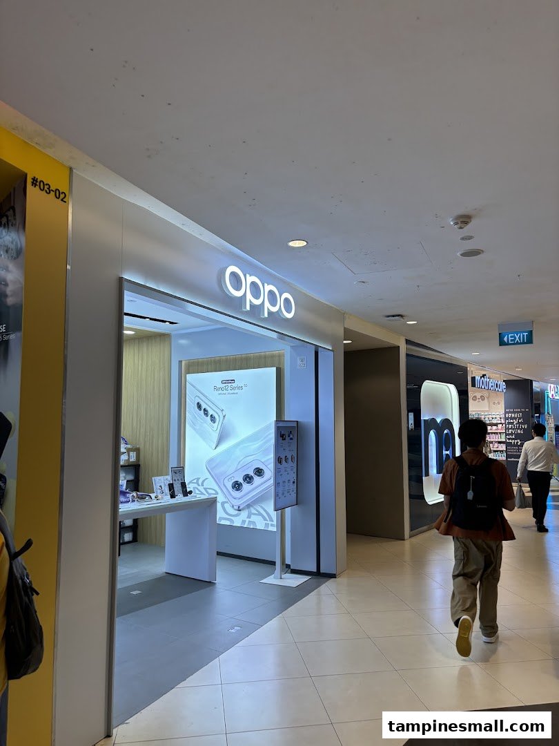 The bright entrance of the OPPO Concept Store at Tampines Mall, showcasing new devices.