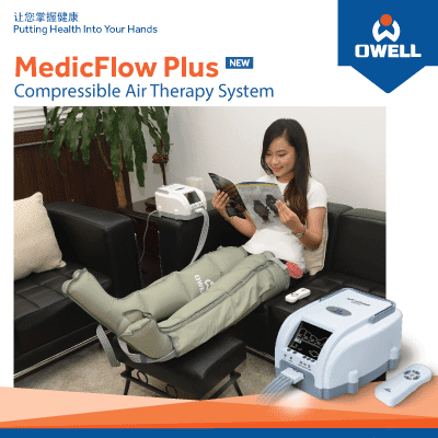 A woman relaxing on a sofa while using the OWELL MedicFlow Plus Compressible Air Therapy System.