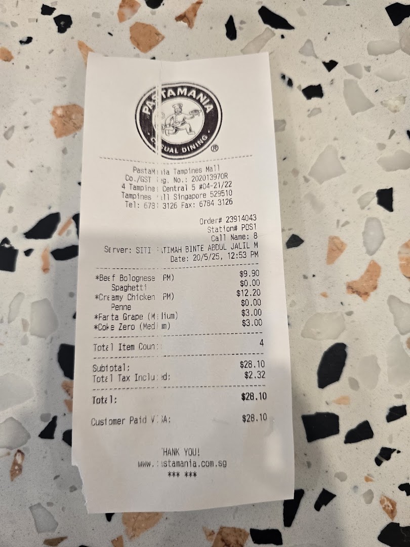 A close-up of a PastaMania receipt showing purchased pasta dishes and drinks.