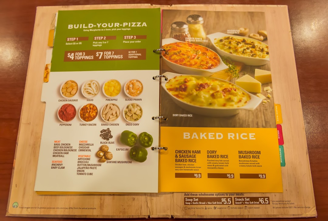 An open menu displaying PastaMania's build-your-own pizza toppings and baked rice dishes.