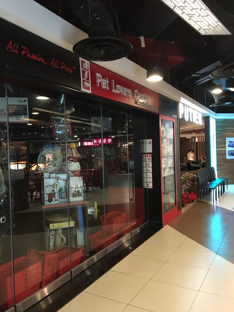 The storefront of Pet Lovers Centre, showcasing its entrance and interior view.