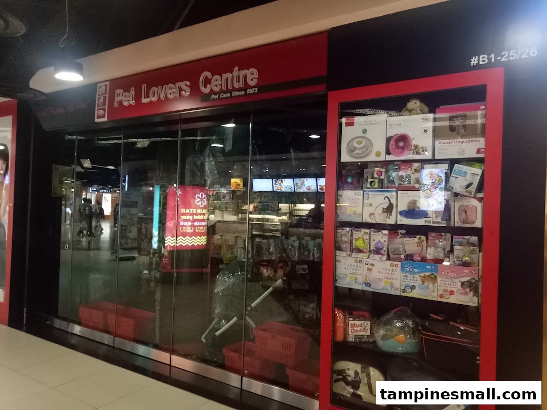 The storefront of Pet Lovers Centre, showcasing pet products in a display window.