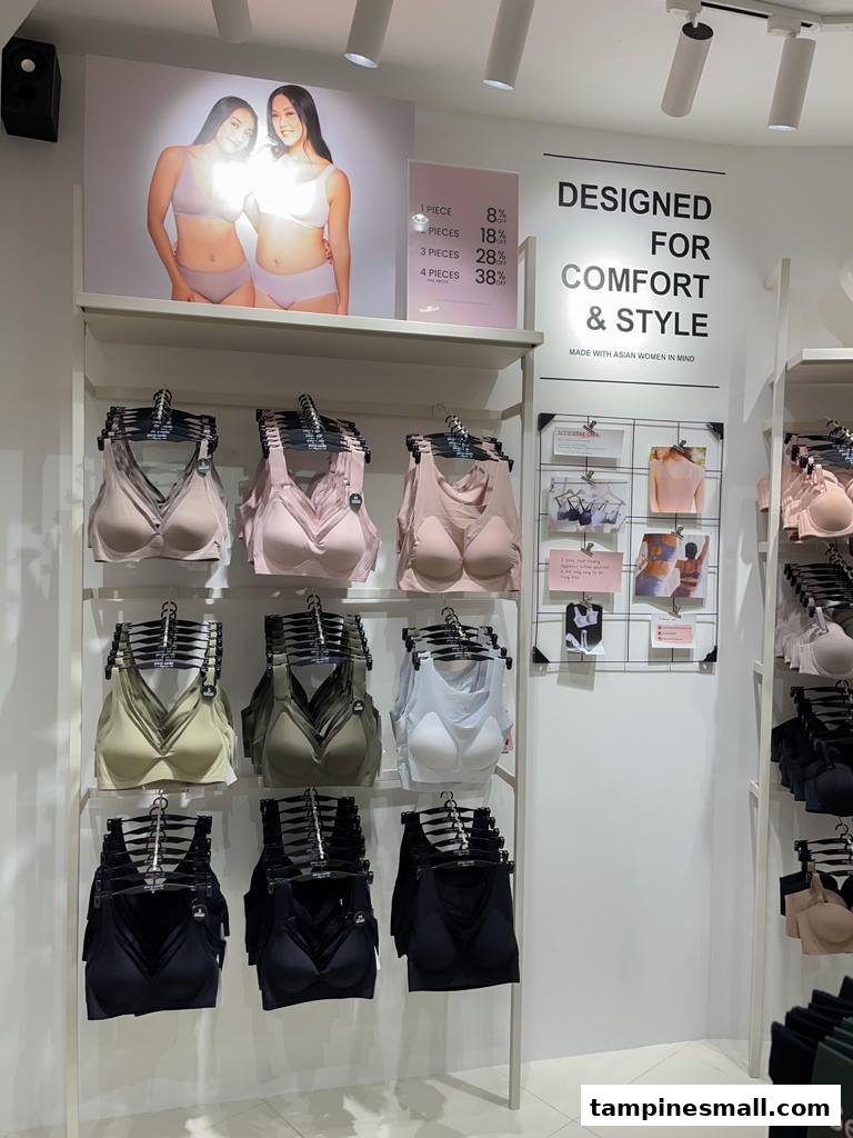 Interior display of Pierre Cardin Lingerie featuring bras, marketing posters, and comfort-focused messaging.
